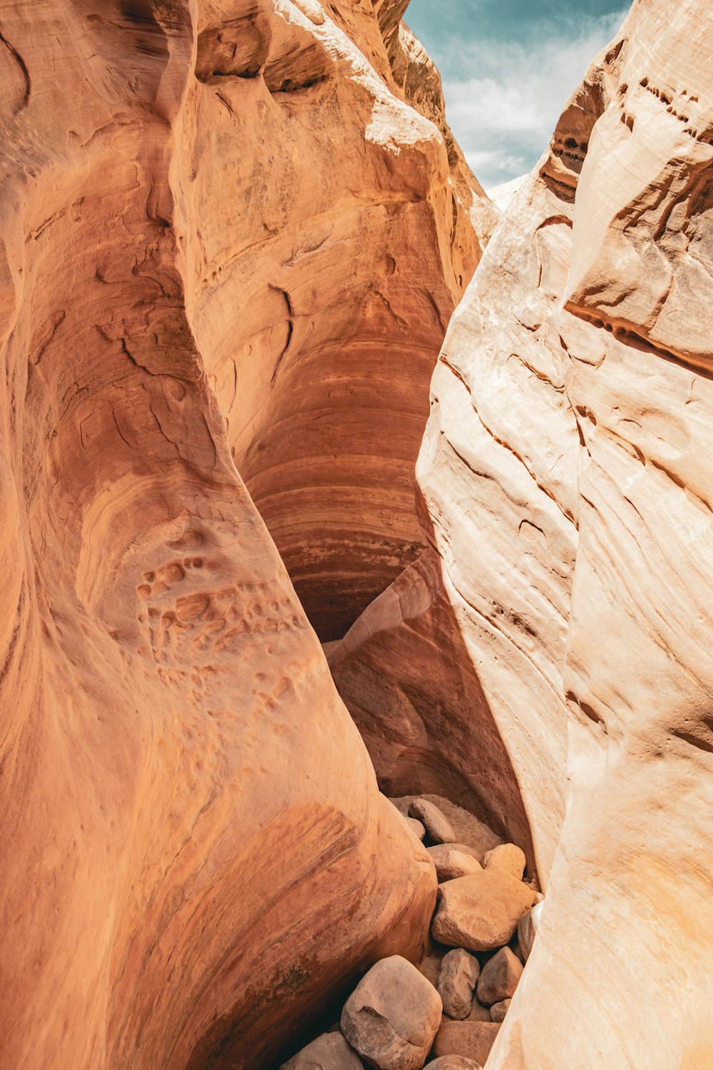 a narrow slot in the side of a mountain