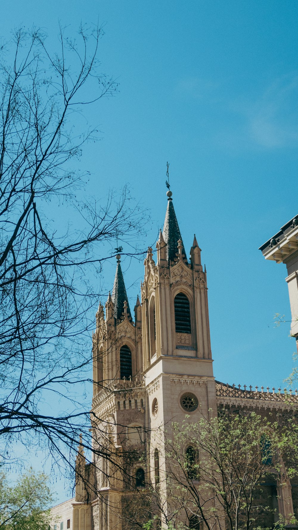 a tall building with a clock on the front of it