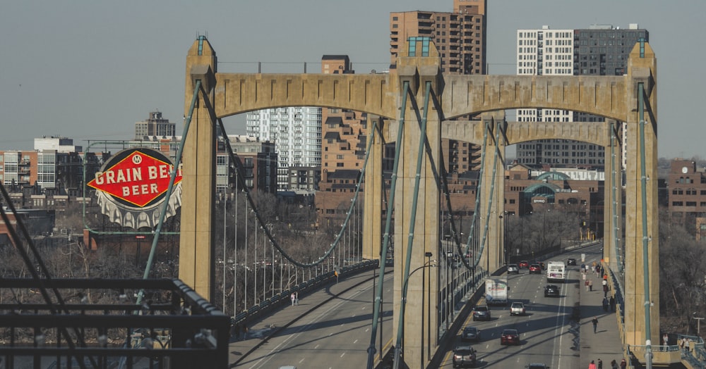 a view of a bridge that has a red sign on it