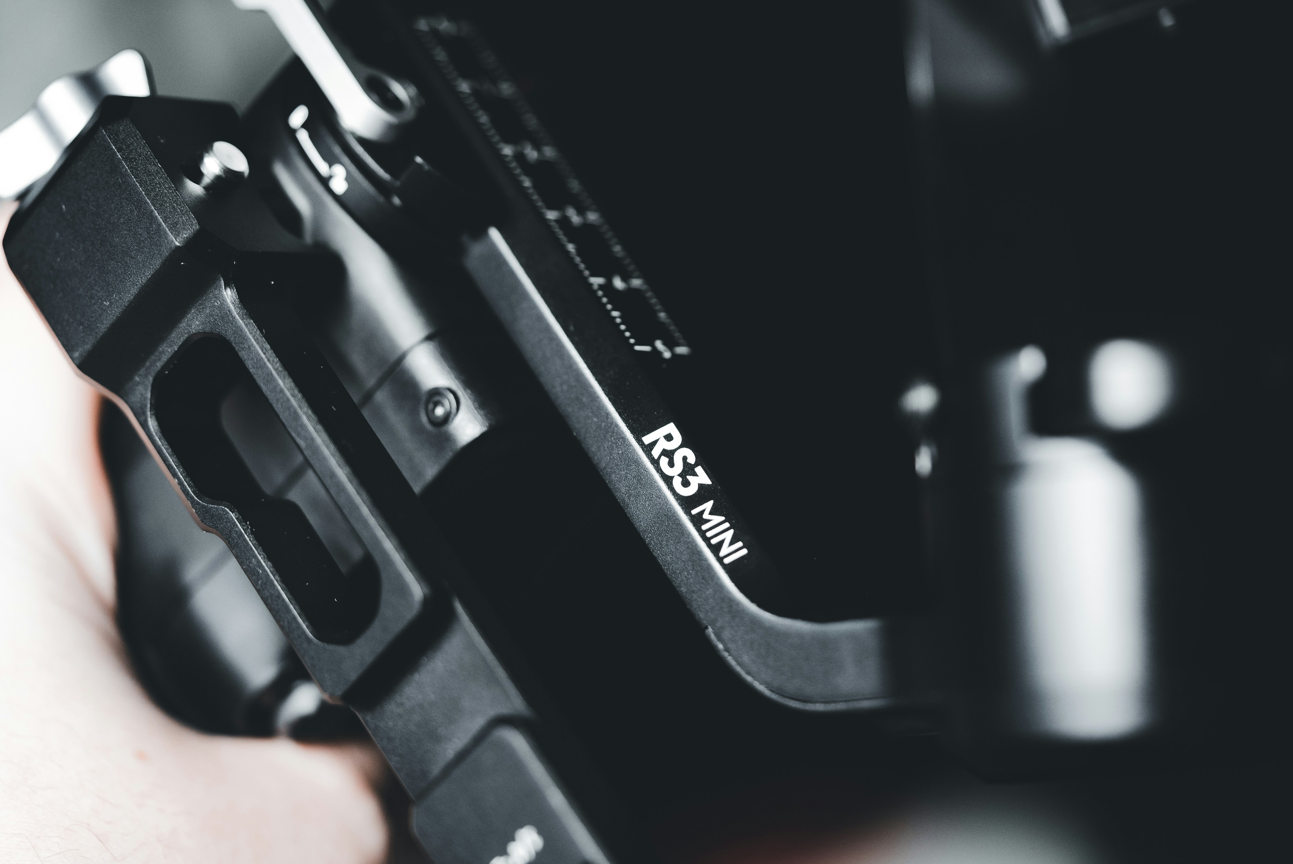 a close up of a person holding a camera