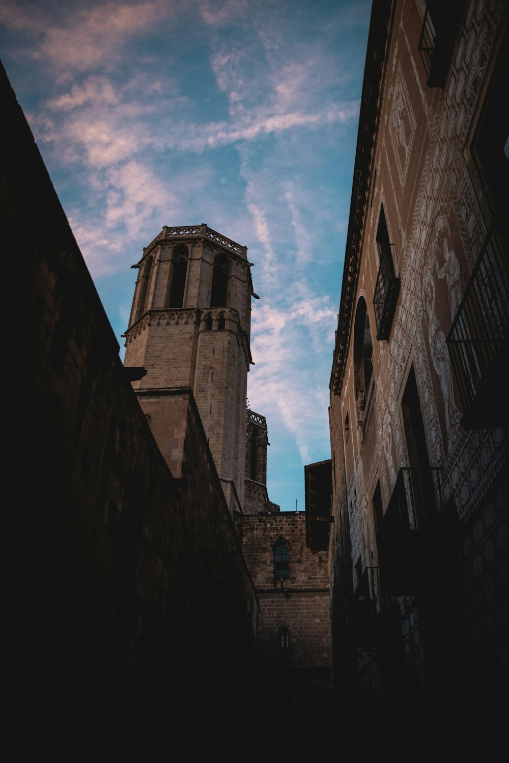 a tall building with a clock on the top of it