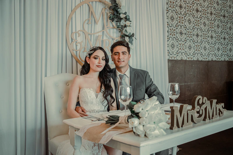 elegant couple seated together at a table