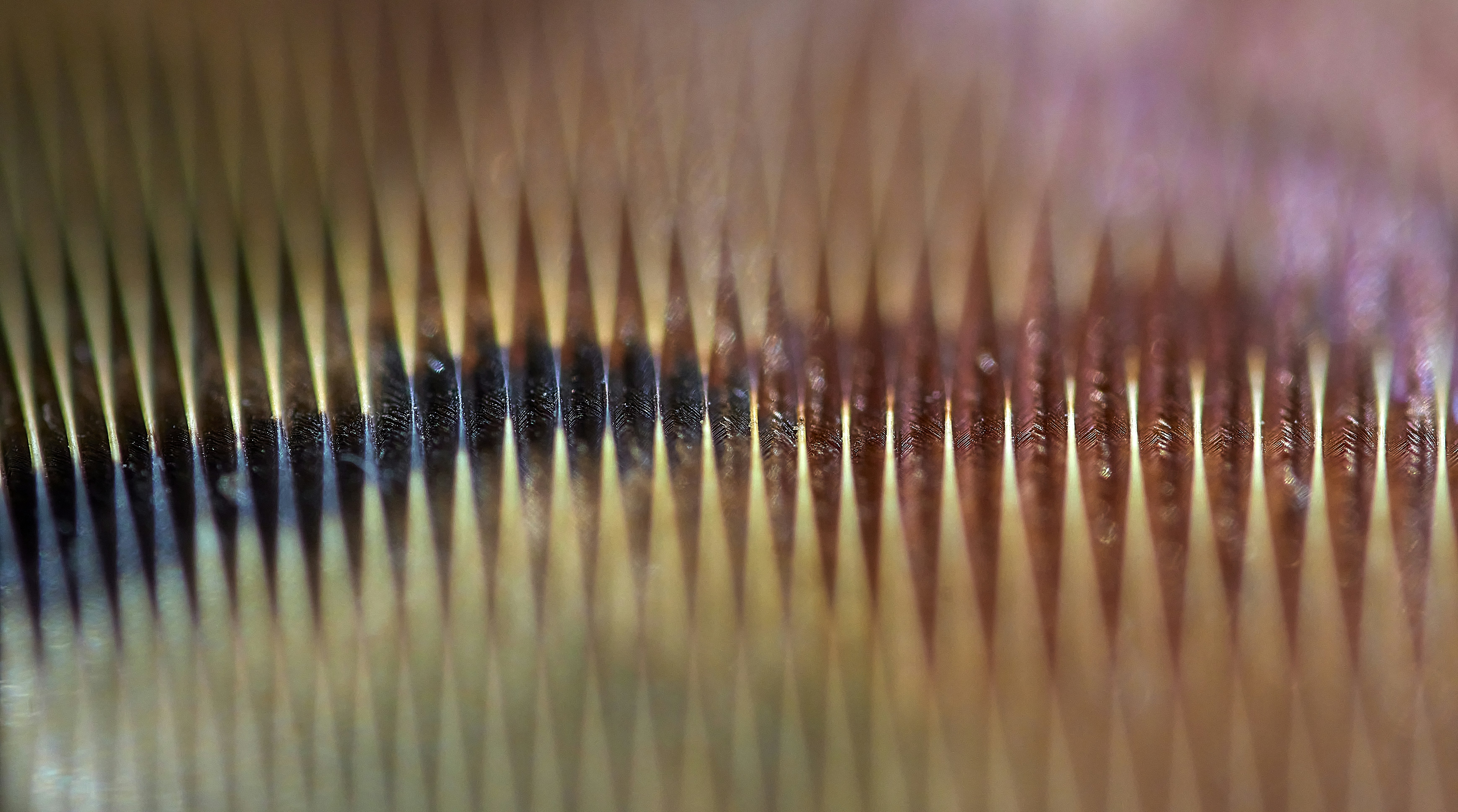 macro photograph of a smartphone internal cooling vapor chamber copper heat pipe
