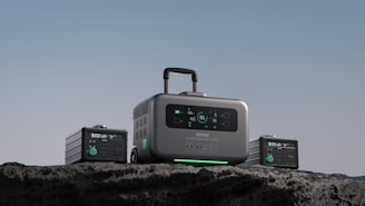 a small apartment generator sitting on top of a rock