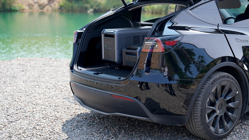 the back of a car with its trunk open