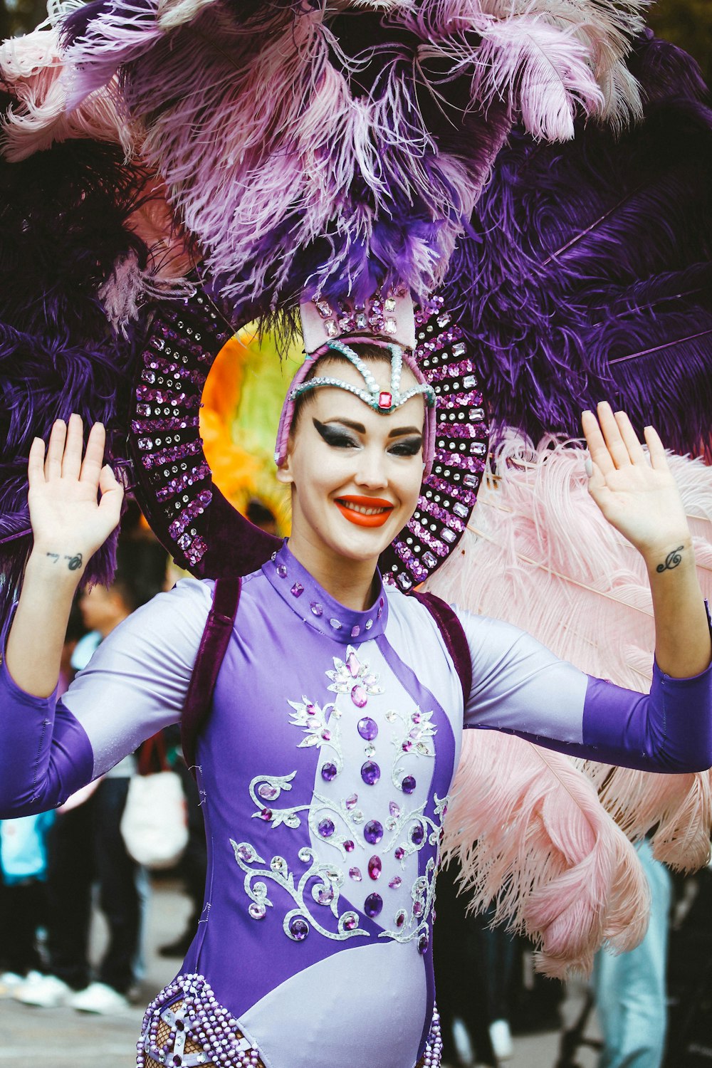 a woman in a purple and white costume