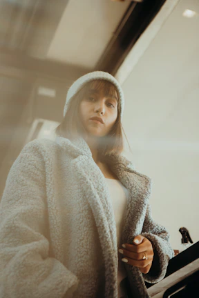 A cozy scene showing a person wearing comfortable, trendy clothes from the shopme-ec collection.