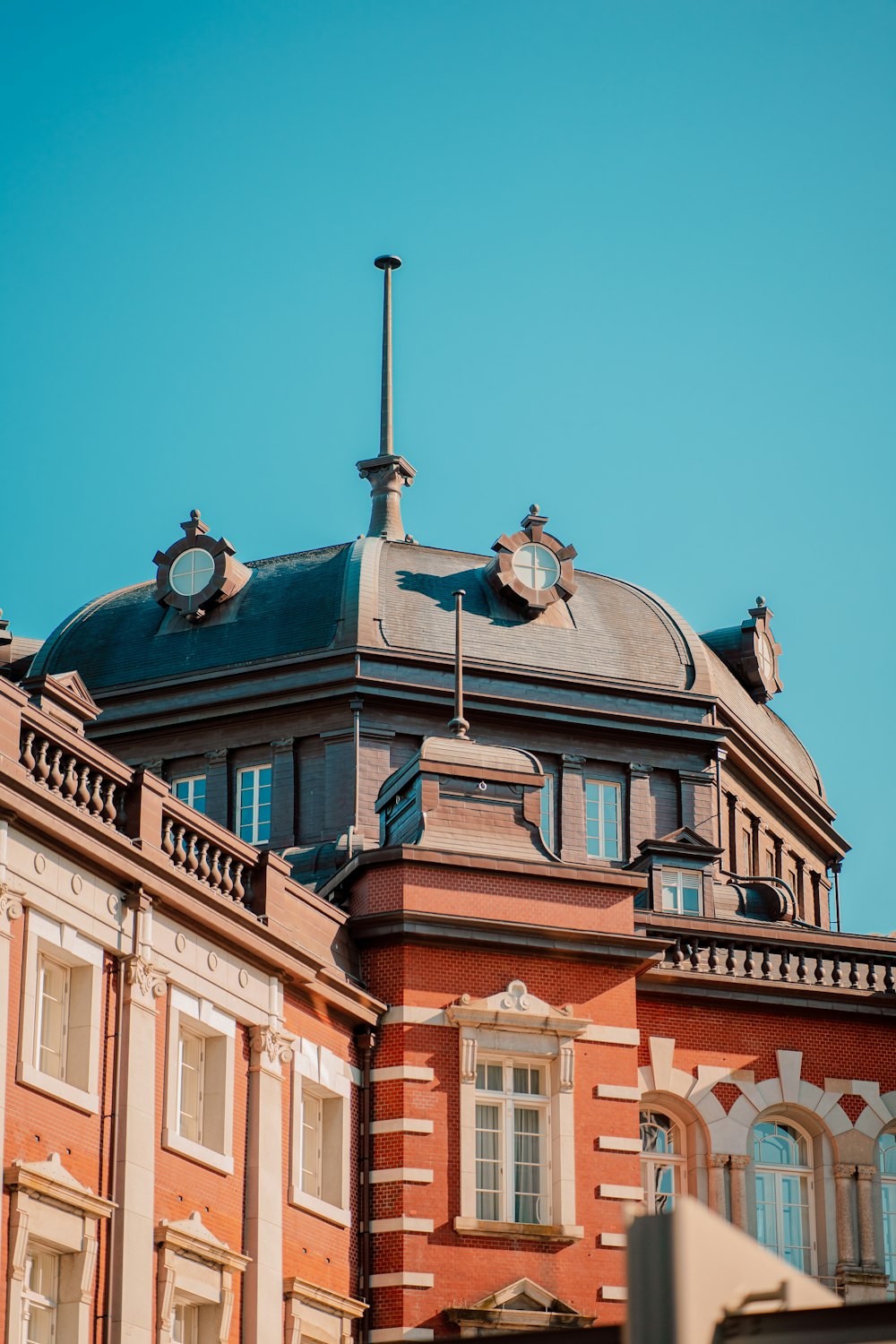 a large building with a clock on the top of it