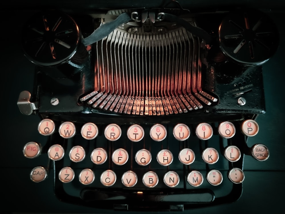 a close up of an old fashioned typewriter