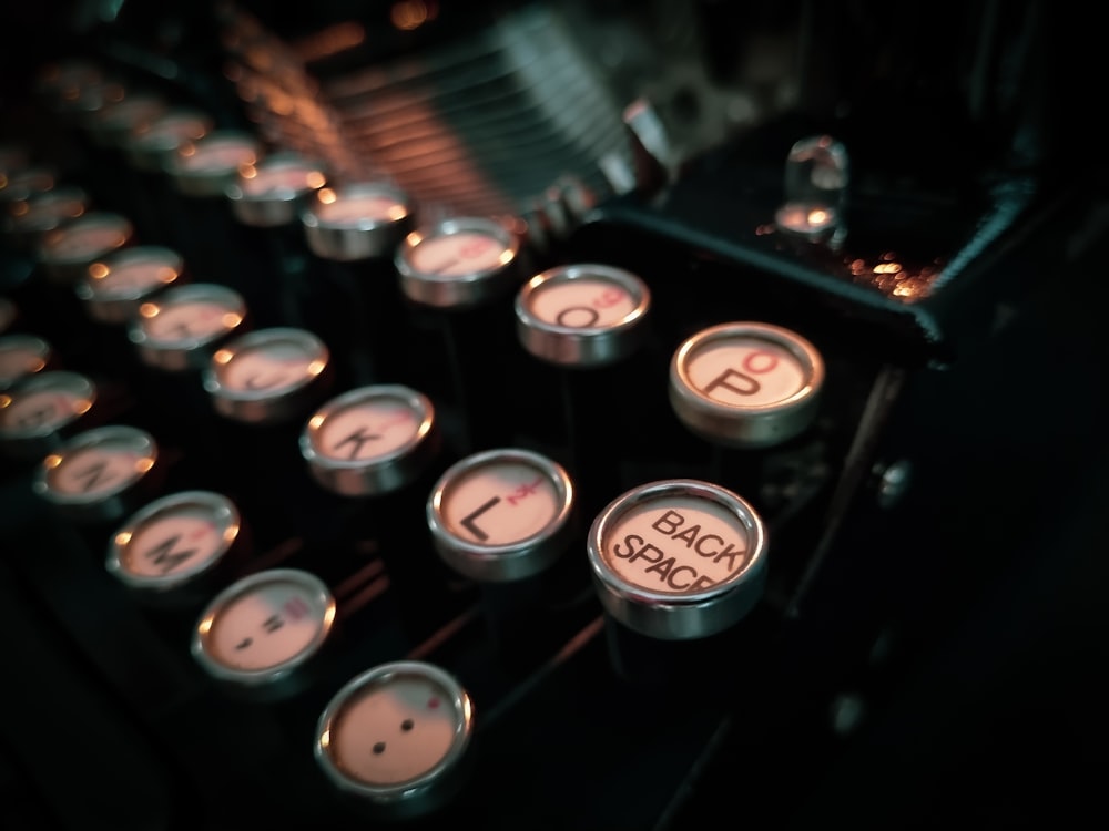 a close up of an old fashioned typewriter