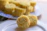 Close-up of a beautifully decorated pastry topped with a custom triangular pastry strip.
