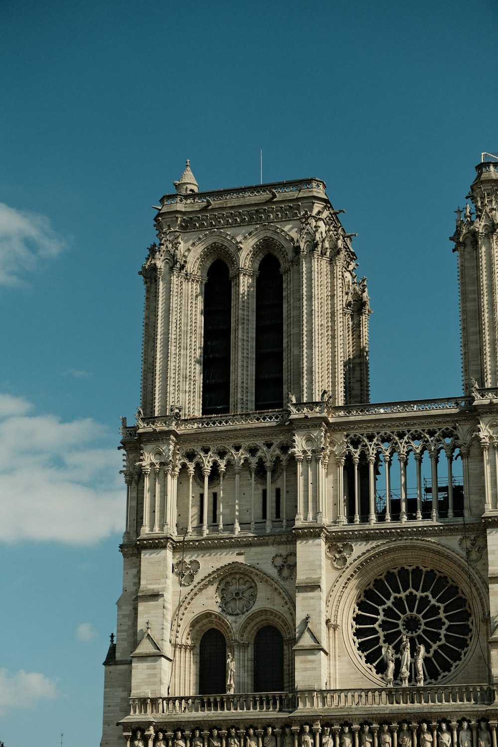 a large cathedral with a clock on the front of it