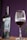 A bottle of wine labeled 'Familia Ibarra Vinos' is placed next to a filled wine glass. The background is a deep purple, adding contrast and elegance to the scene.