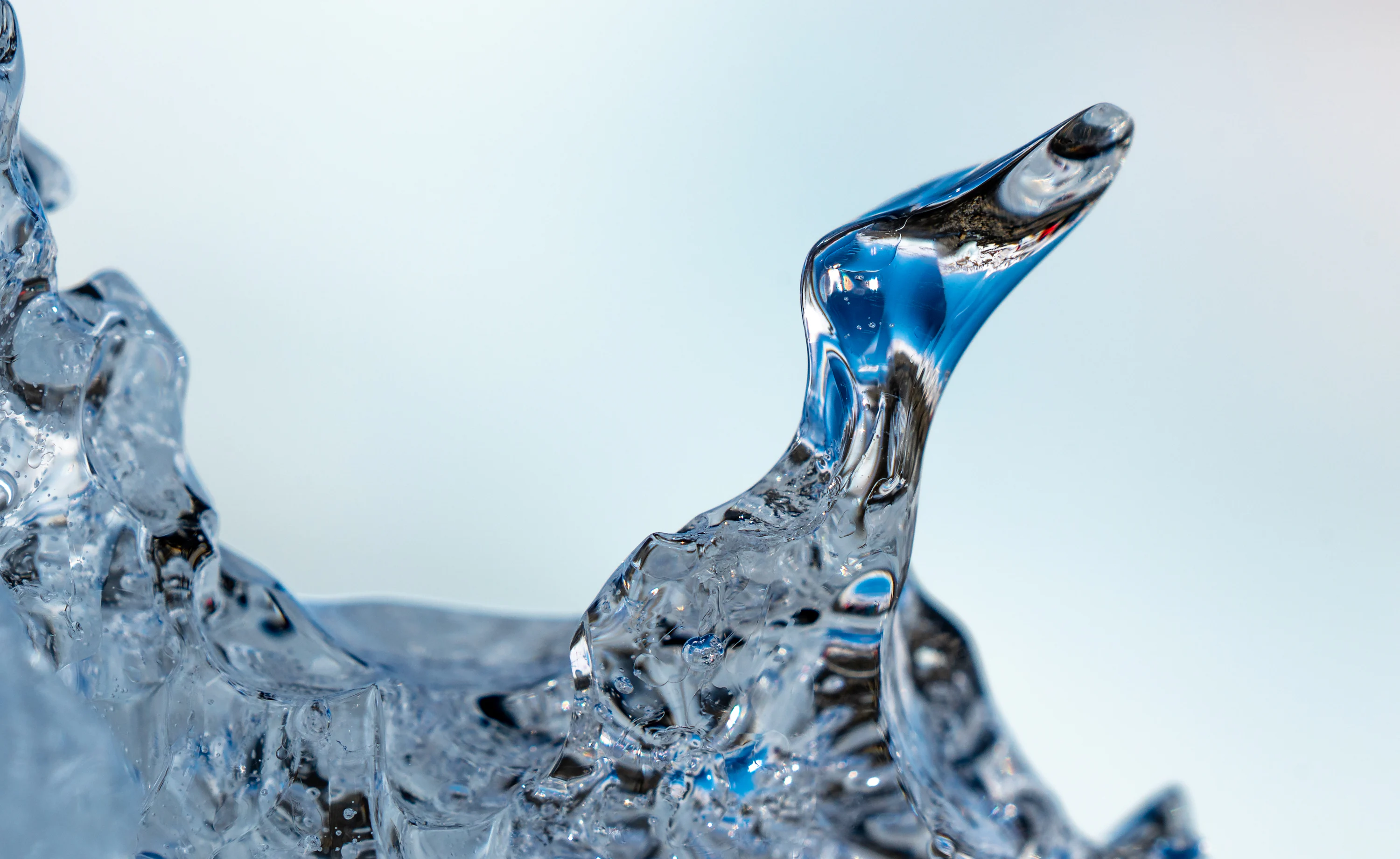 a close up of a water fountain made of ice