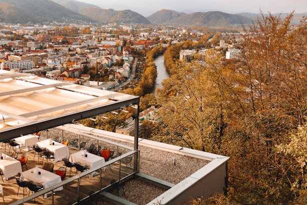 A rooftop dining area overlooking the Kashi Vishwanath temple and the holy river.