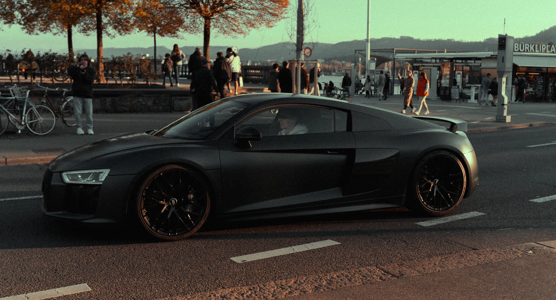 black and brown leather padded tub sofa