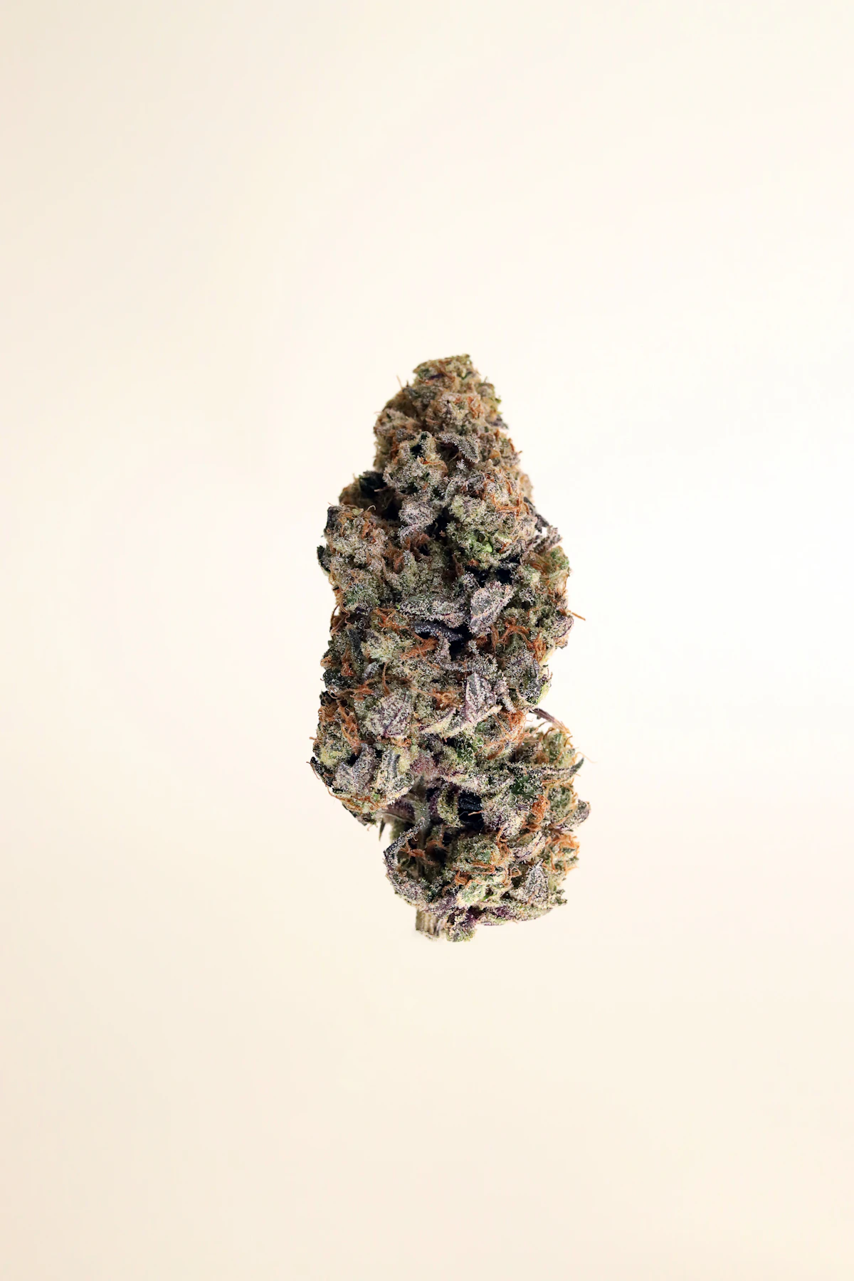 Sunrise Spark sativa cannabis bundle on a wooden surface