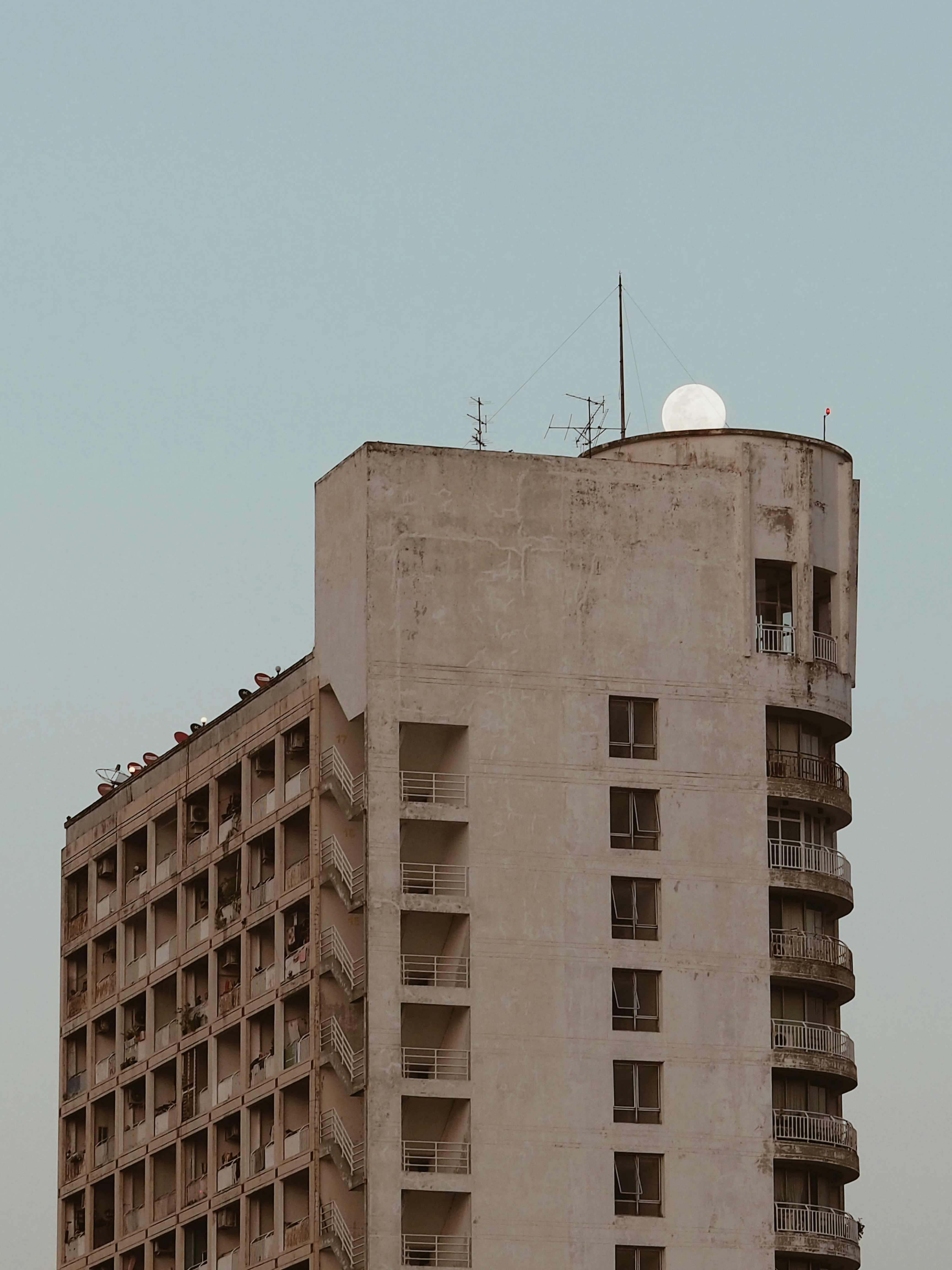 a very tall building with a clock on the top of it