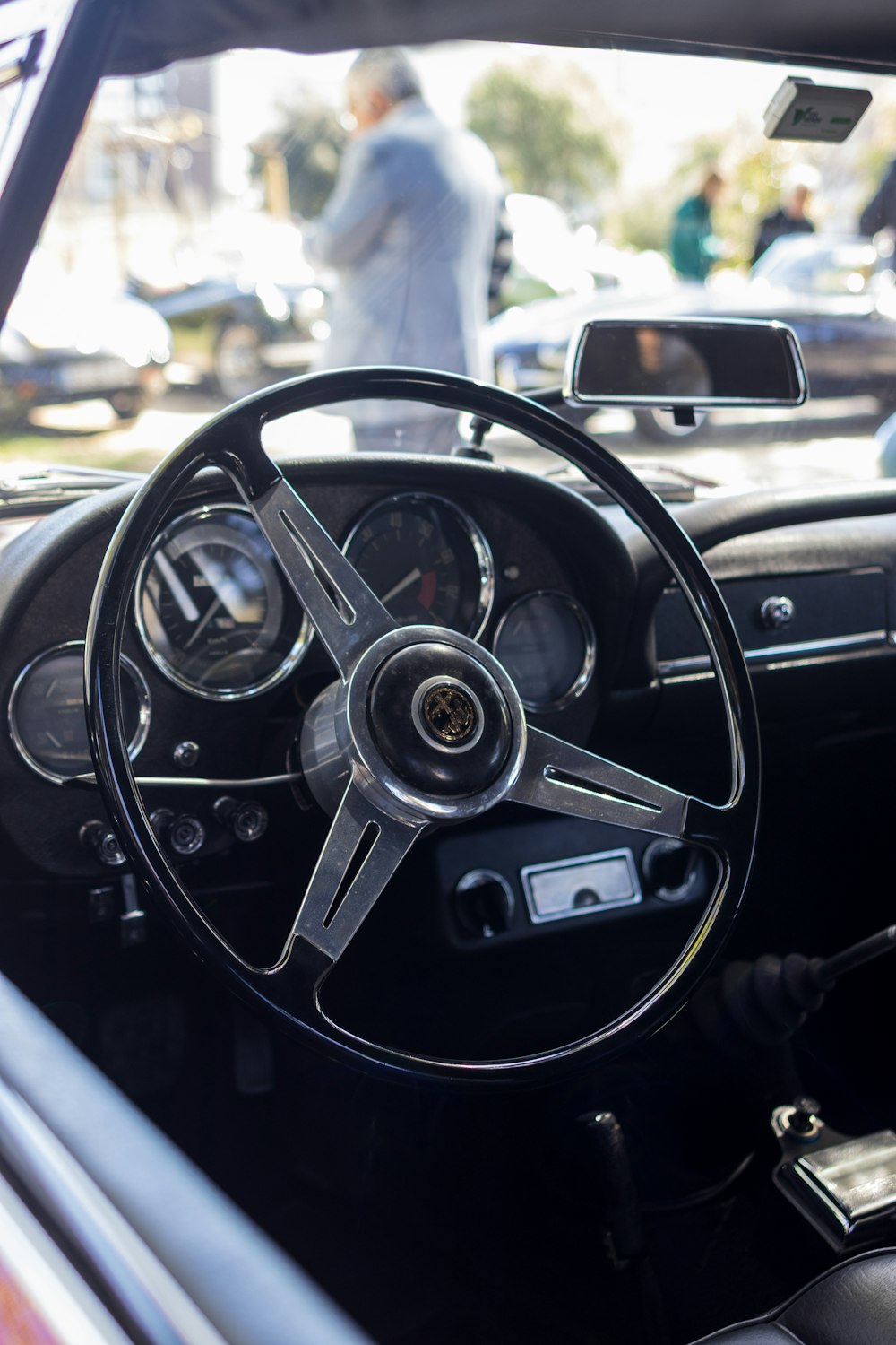 the interior of a car with a steering wheel