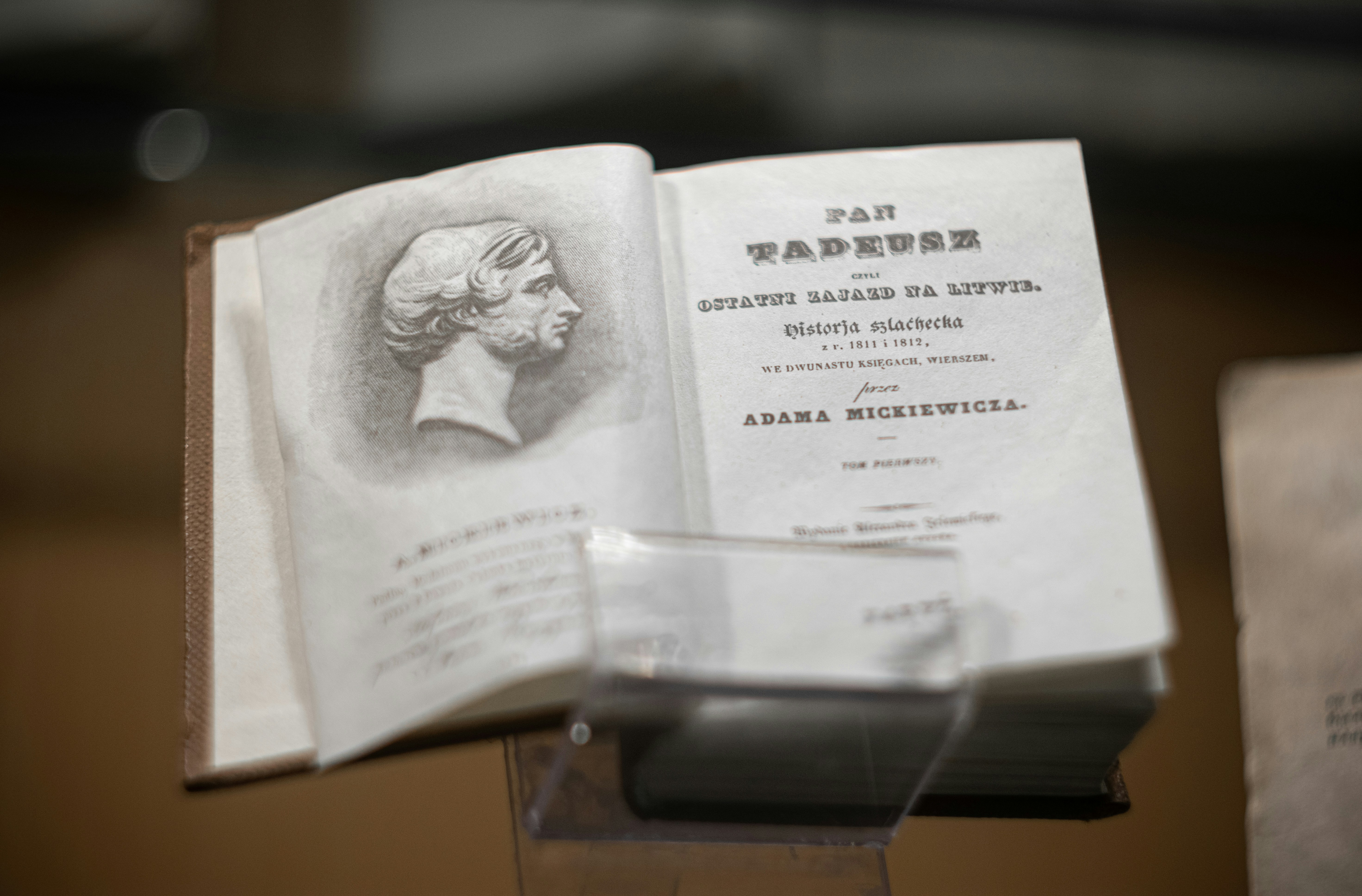 an open book with a picture of a woman on it