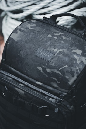 Close-up of tear-resistant fabric and water-repellent coating on a mountaineering backpack.