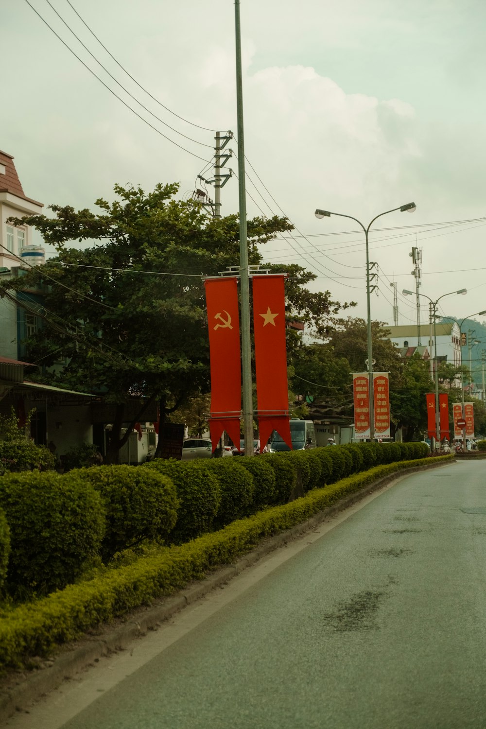 a street with a lot of signs on the side of it