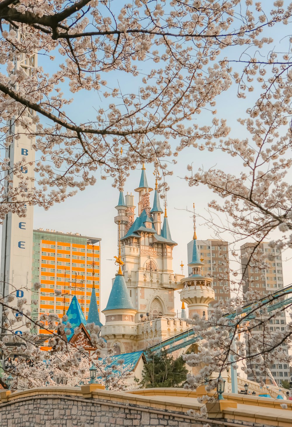 a view of a castle through the trees