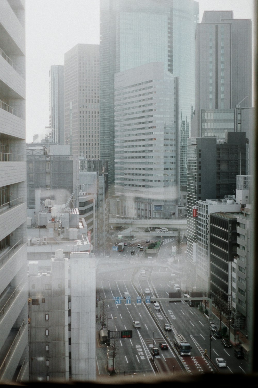 a view of a city street from a window