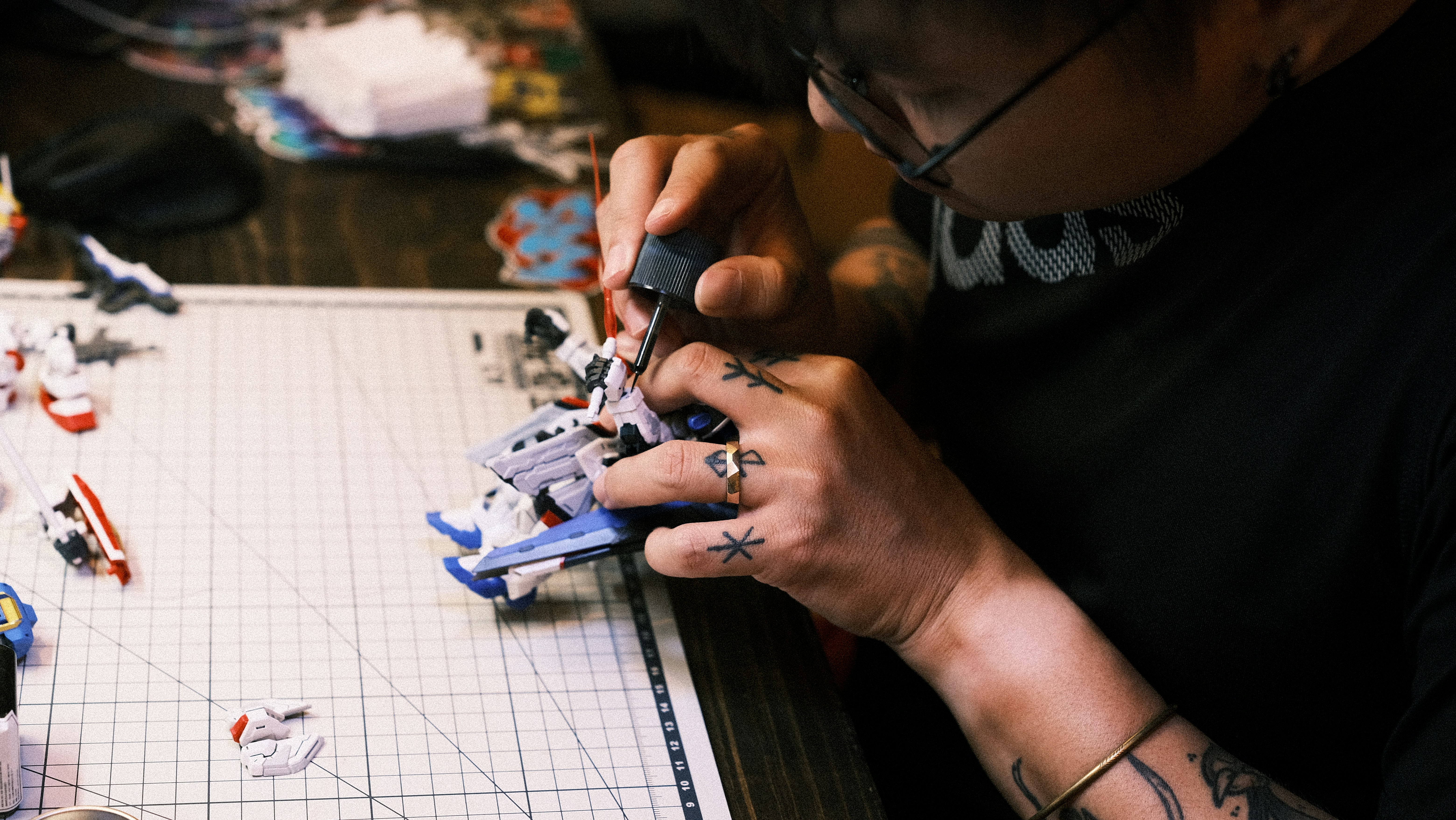 a man is working on a robot model, 