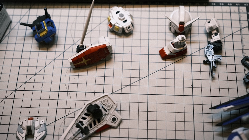 a group of toy cars sitting on top of a table