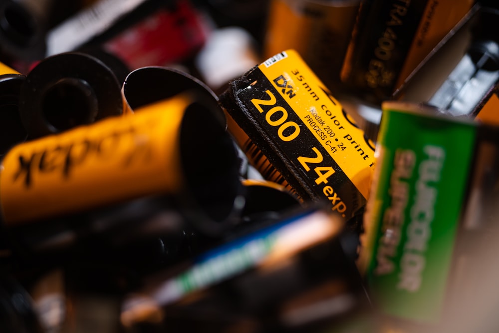 a pile of batteries sitting on top of a table