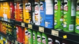 a display in a store filled with lots of drinks