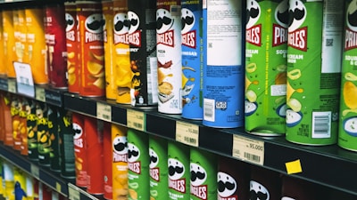 a display in a store filled with lots of drinks