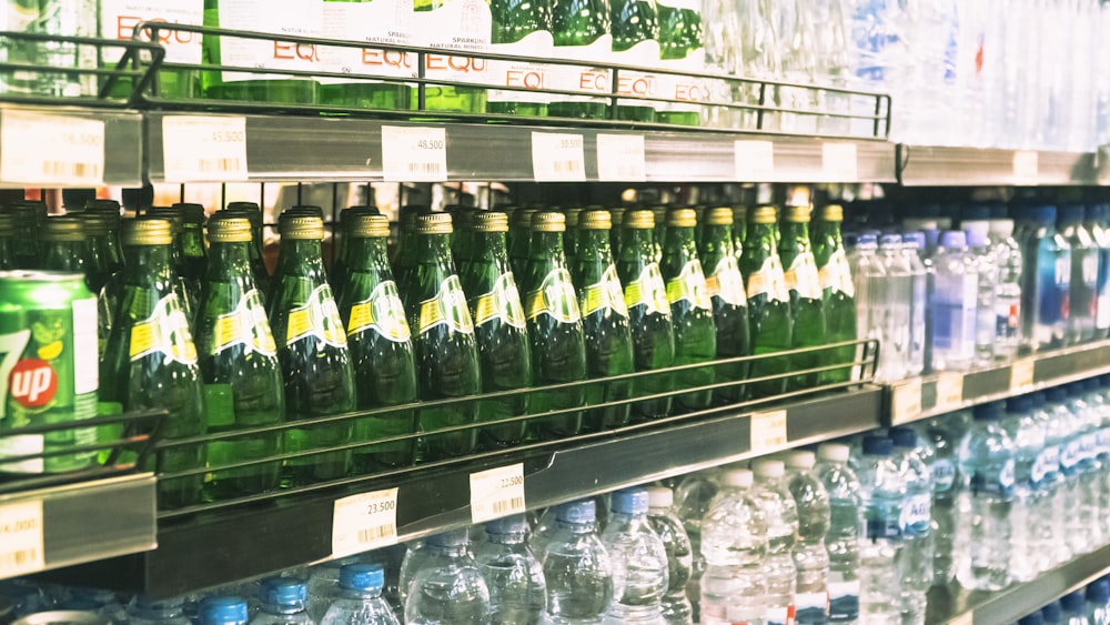 a display in a store filled with lots of bottles of water