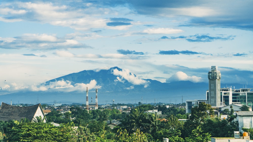 a view of a city with a mountain in the background