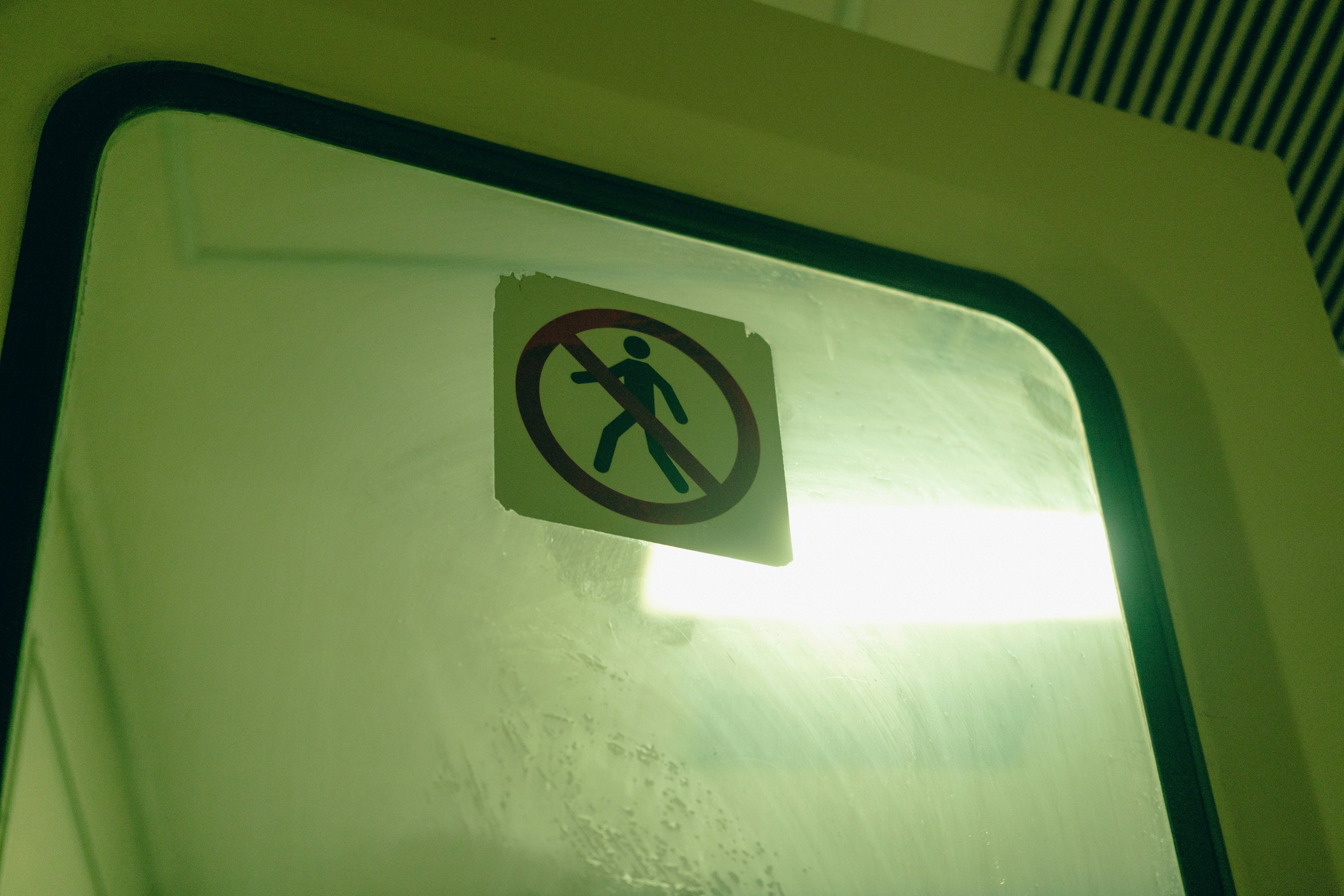 a sign that is on the side of a door