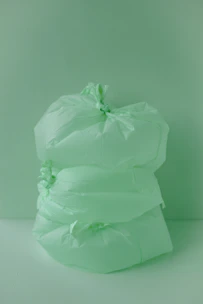 Medical-grade plastic bags used in hospital settings, shown in a clean environment.