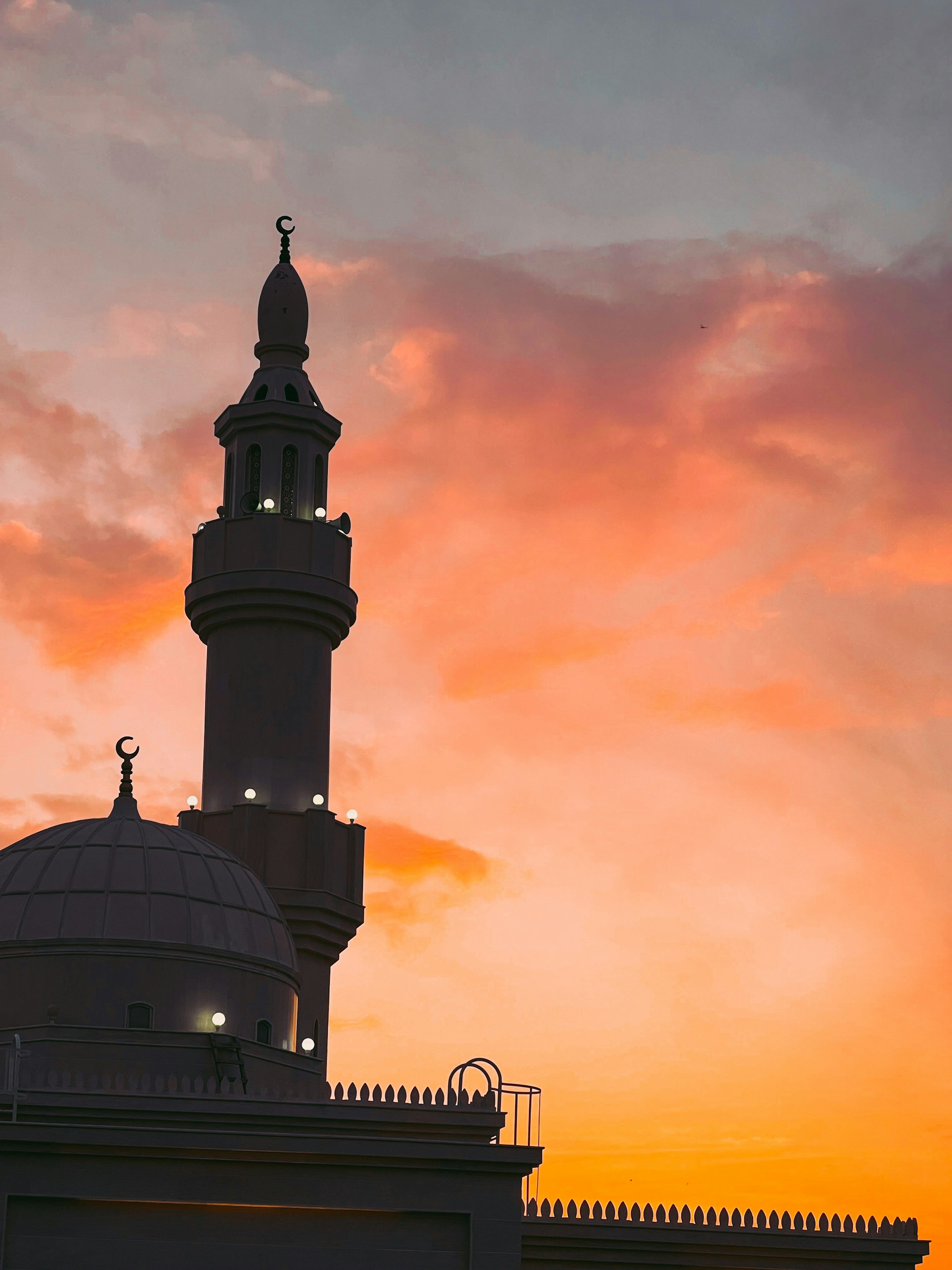 woman wearing yellow long-sleeved dress under white clouds and blue sky during daytime