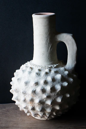 Side profile of a signature uruuk ceramic piece highlighting its brutalist yet sophisticated form.
