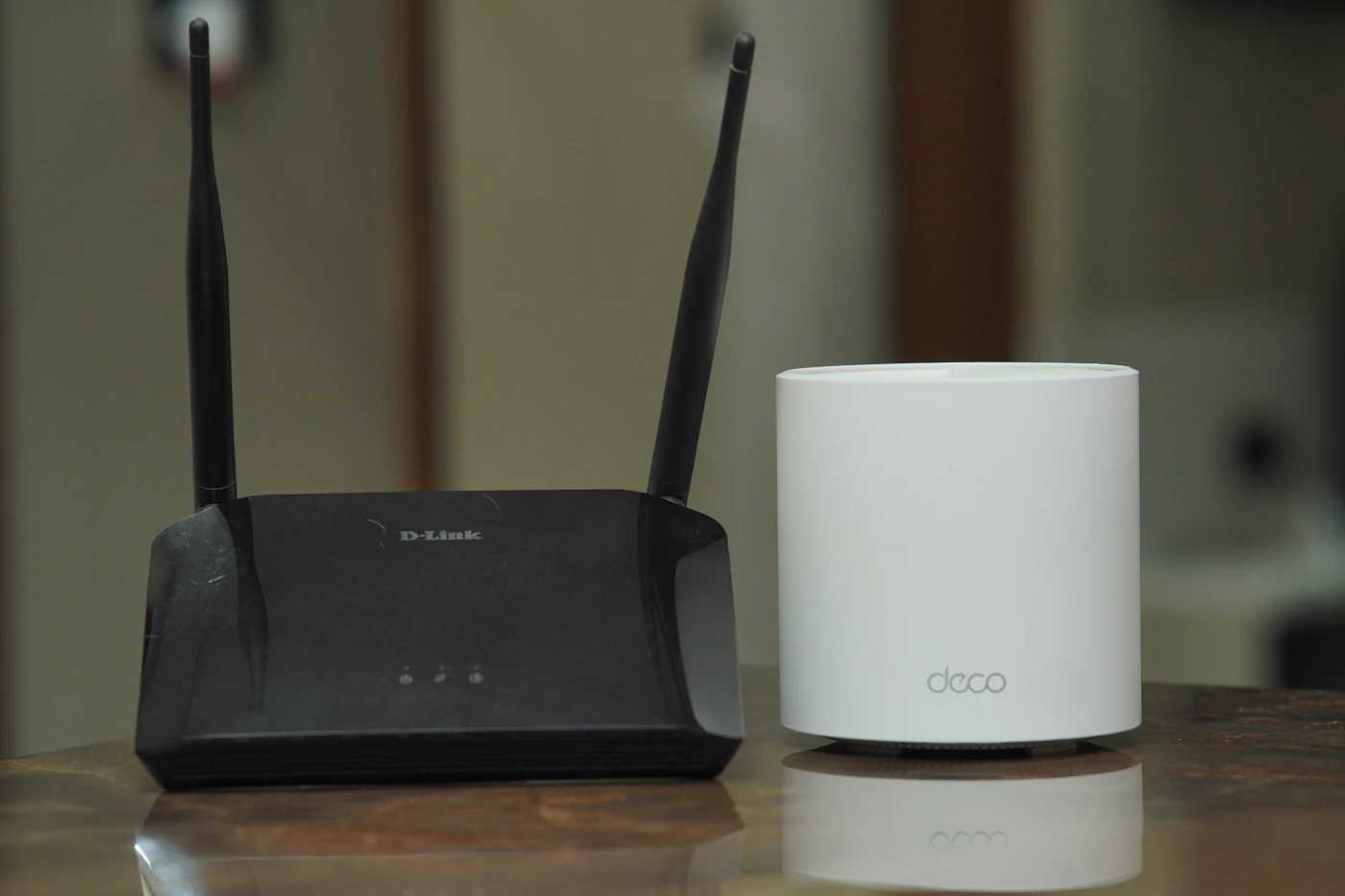 Two home internet routers on a table
