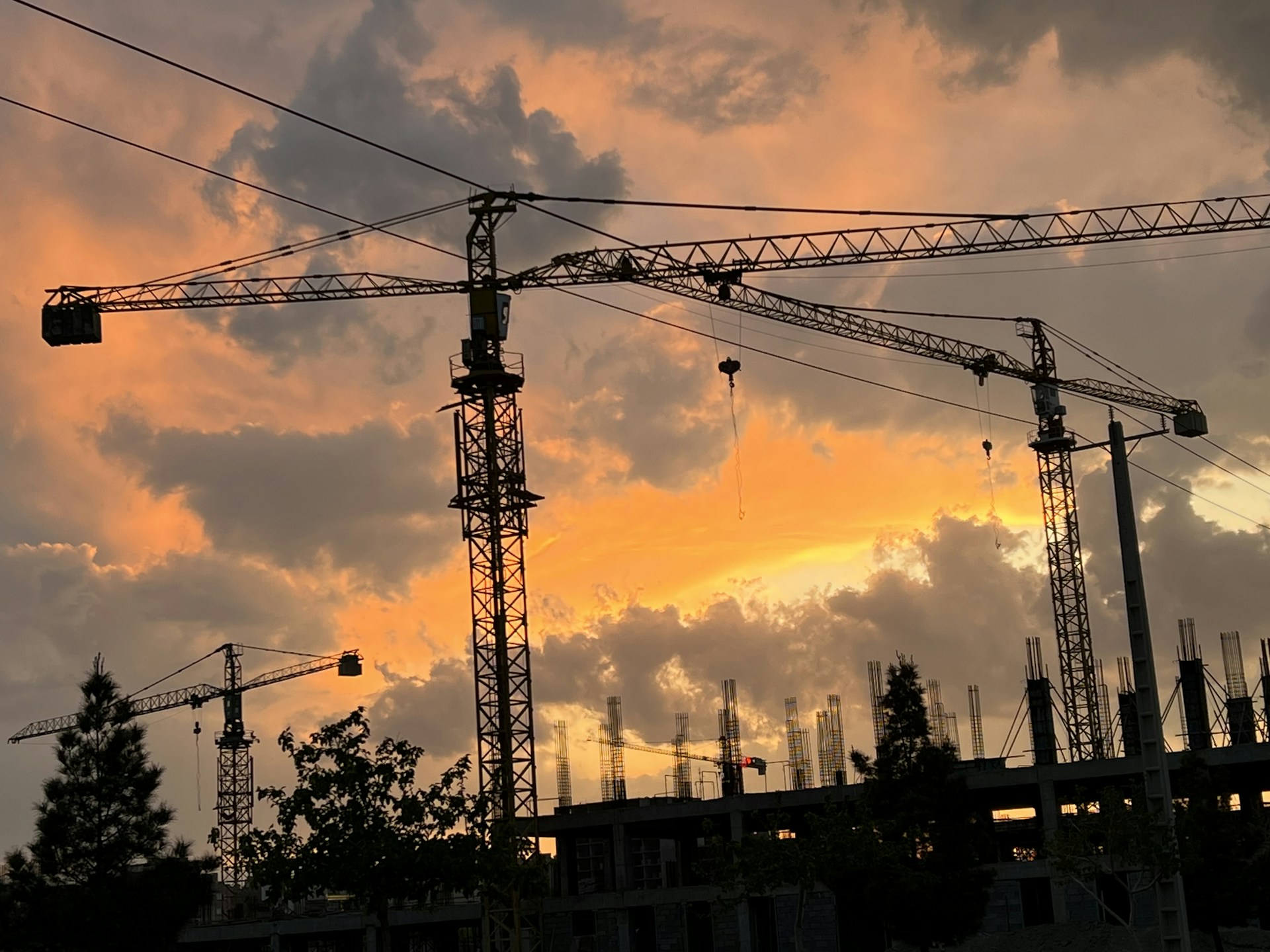 woman wearing yellow long-sleeved dress under white clouds and blue sky during daytime