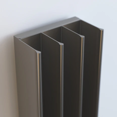 The organizer mounted beside a sleek black door, blending natural bamboo with contemporary style.