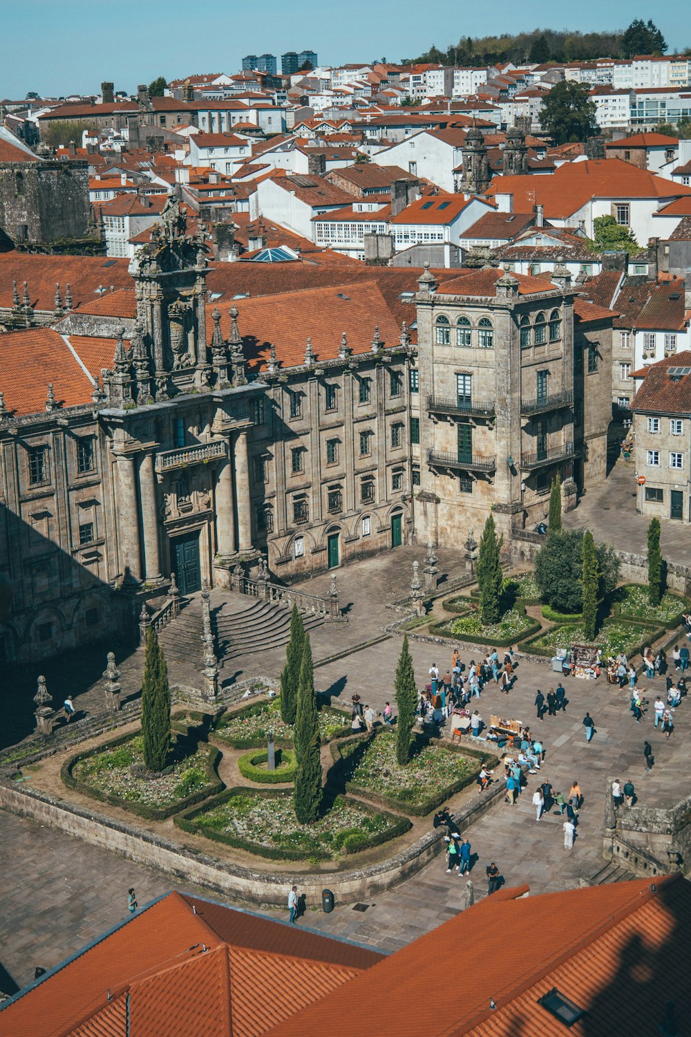 a group of people standing in front of a large building