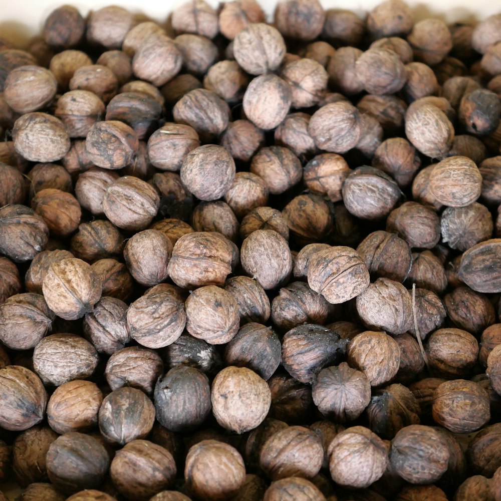 a pile of nuts sitting on top of a table