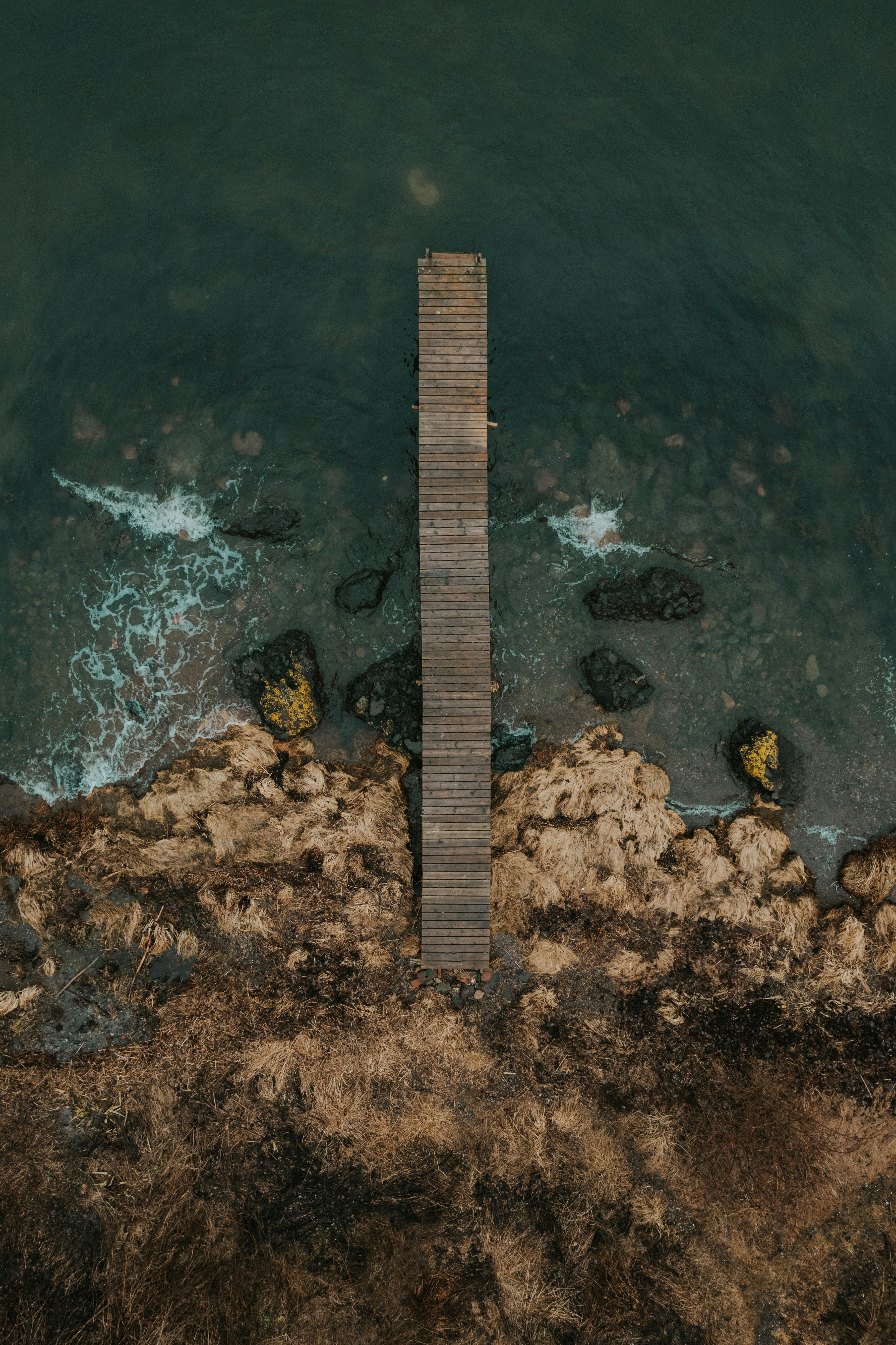 An aerial view of a pier in the water photo – Free Norway Image on Unsplash