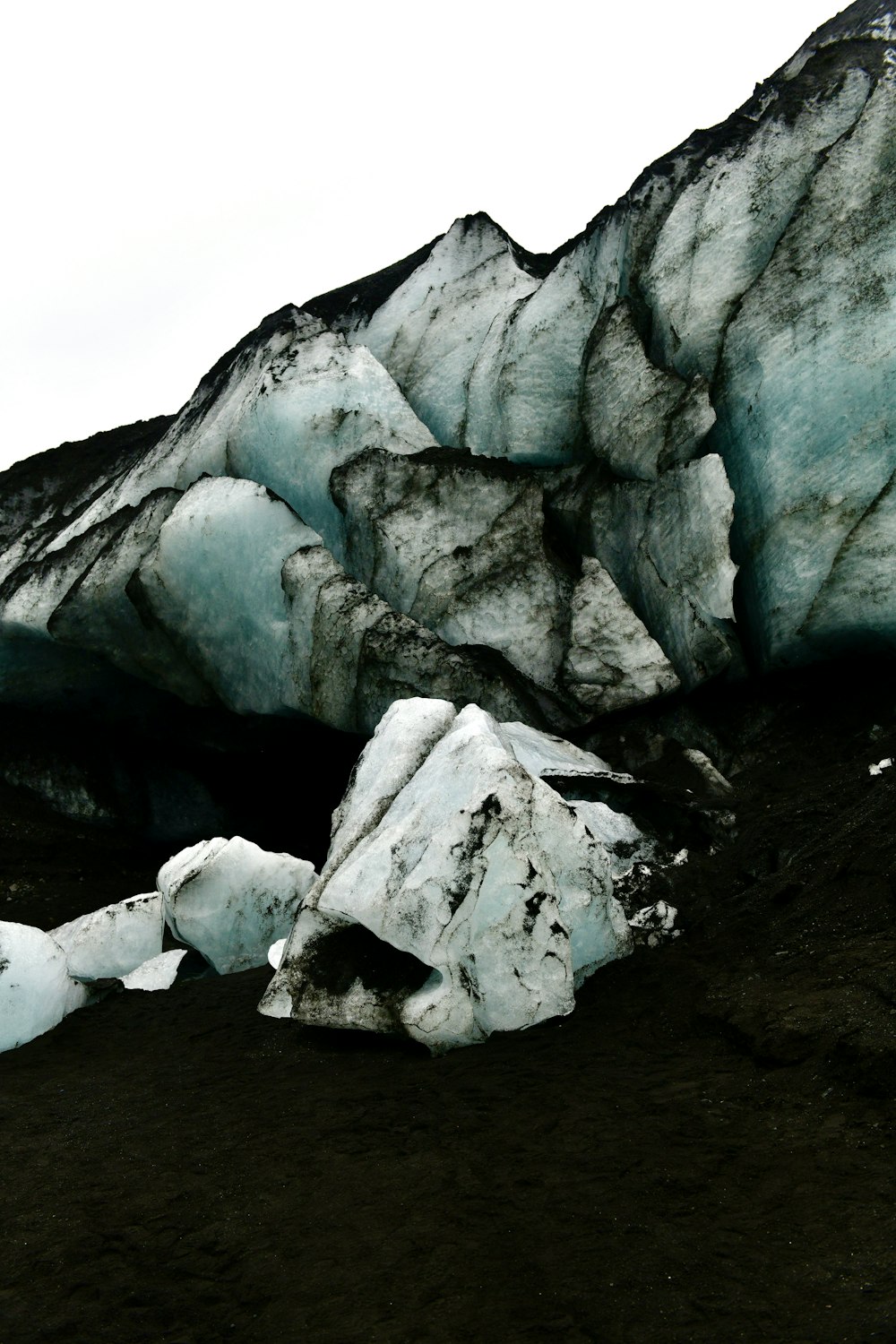 a group of icebergs sitting on top of a mountain