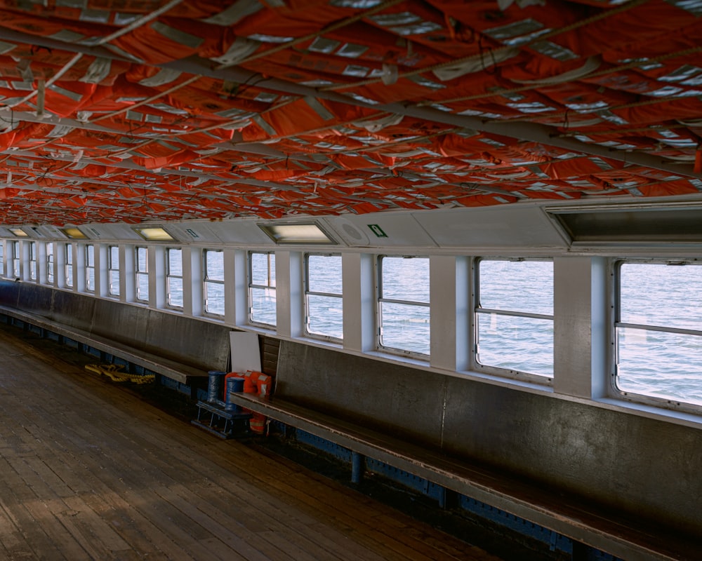 the inside of a boat with lots of windows