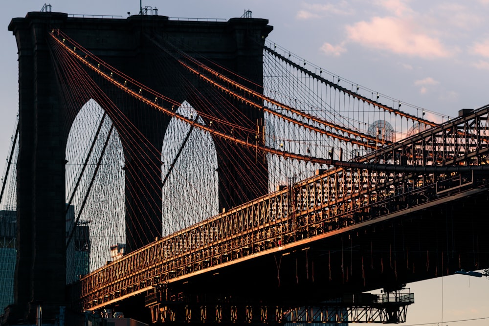 a view of the brooklyn bridge from across the river