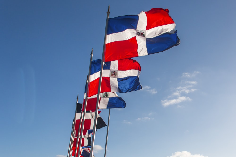 a group of flags that are flying in the air