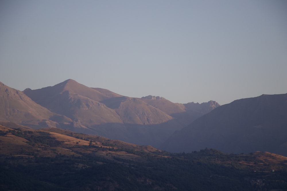 a view of a mountain range from a distance